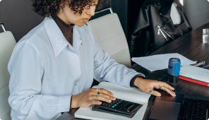 female_accountant_using_a_calculator